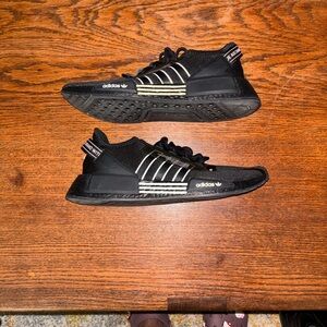 Adidas Black Sneakers with White and Gold Accents